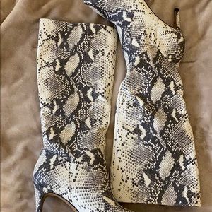 Knee high snakeskin boots